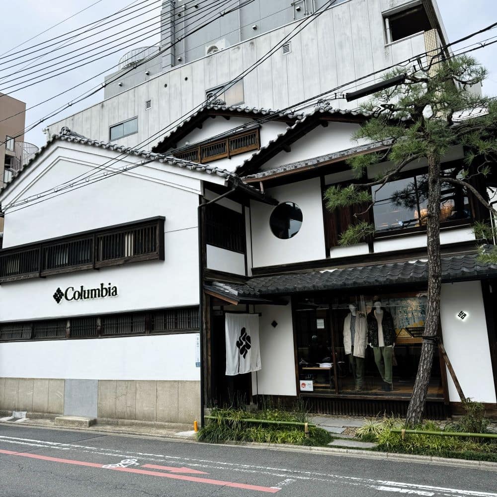 Traditional Japanese machiya style exterior of the Columbia Sportswear retail store on a street in Kyoto, Japan.
